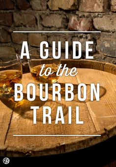 two glasses of bourbon sitting on top of a wooden barrel with the words guide to the bourbon trail