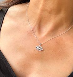 "EVIL EYE NECKLACE 🧿 -Unique Necklace -Handmade -Sterling Silver 925 -Zircon This impressive evil eye necklace is perfect to wear everyday! It is also ideal for a gift to yourself or to protect someone you love! 💕 > MATERIALS     Gold 18K,14K,12K     Sterling Silver 925  > RING SIZE    All my rings are US standard size,in case you do now know whats your ring size you could also go to your local jewelry store to measure     your finger size to get your correct ring size. Please contact me for the ring size details before placing the order.  > PACKAGING    All of our products are beautifully packaged for gifts in a jewelry box.    All of our engagement rings are packaged in PREMIUM jewelry boxes for free. > ADDITIONAL SERVICE    Engraving Service    All sizes    Costum order    > Custom Or Blue Necklaces With Diamond Eyes As Gift, Blue Necklace With Diamond Eyes As Gift, Blue Sterling Silver Necklace With Diamond Eyes, Blue Sterling Silver Jewelry With Diamond Eyes, Elegant Evil Eye Jewelry For Anniversary, Sterling Silver Necklace With Diamond Eyes Round Pendant, Sterling Silver Necklace With Round Diamond Pendant, Elegant Silver Necklace With Diamond Eyes, Silver Evil Eye Necklace In Fine Jewelry Style