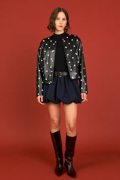 Step up your style game with our Polka Dot Leather Jacket. Featuring a chic round neckline and long sleeves, this jacket is perfect for adding a trendy touch to any outfit. The playful polka dot pattern adds a fun and flirty vibe, while the tuck detail at the bottom hem adds a touch of sophistication. Dress it up for a night out or keep it casual for a day of running errands. Made with high-quality leather, this jacket is a timeless addition to your wardrobe. Classic Skirts, Bubble Hem, Closet Inspiration, Faux Leather Jacket