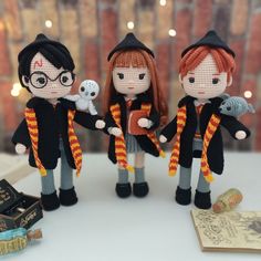 three dolls are dressed in harry potter costumes