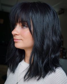 Rich Black Lob with Feathered Bangs Medium Long Bob With Bangs, Shoulder Length Rocker Hair, Black Shoulder Length Hair With Bangs, Brunette Bangs Shoulder Length, Shaggy Lob With Bangs Shoulder Length, Bangs Plus Size, Mid Length Haircut With Bangs, Mid Length Haircut For Thick Hair, Bangs Haircut Ideas