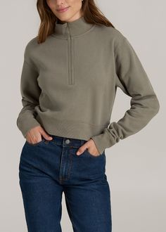 The Half-Zip Sweatshirt for Tall Women Cozy Meets Cool Styling Elevate your casual look with our Wearever 2.0 Half-Zip Cropped Sweatshirt for tall women. This fleece half-zip sweatshirt combines the warmth you need with the style you crave. Featuring a fashionable half zip and a ribbed hem to keep things chic and snug, this cropped women's tall sweatshirt is your new go-to for those chill vibes days. Long sleeves and a relaxed fit ensure you stay comfortable and covered in all the right places.• Athleisure Tops With Ribbed Cuffs For Outdoor, Cozy Fit Half-zip Top With Ribbed Cuffs, Sporty Outdoor Top With Ribbed Cuffs, Sporty Tops With Ribbed Cuffs For Outdoor, Casual Half-zip Loungewear Top, Casual Loungewear Half-zip Top, Cozy Long Sleeve Tops For Outdoor Activities, Cozy Half-zip Top With Ribbed Cuffs, Casual Cozy Fit Tops For Outdoor