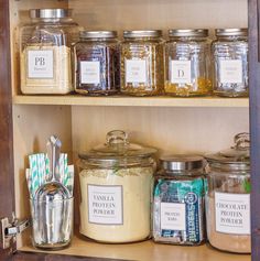 the shelves are filled with different types of spices