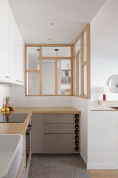 the kitchen is clean and ready to be used for wine tasting or as a dining area