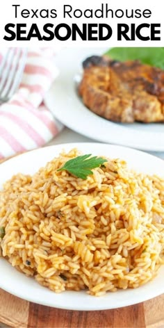 a white plate topped with rice covered in sauce and garnished with parsley