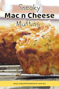 two muffins sitting on top of a cooling rack with the words sneaky mac n cheese muffins