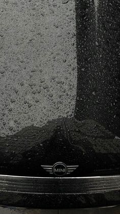 the front end of an oven with water droplets on it's glass and door