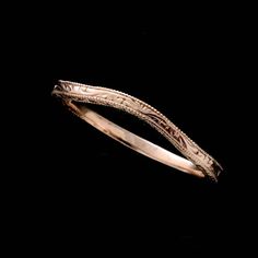 Skinny Engraved Band Art Deco Replica Contour Delicate Wedding Band 1.6mm Subtly curved women's wedding band made of 14k gold is designed to match your engagement ring. High polish, beautiful engraved sides and top (except for short strip to allow for re-sizing), milgrain finished edges. Dimensions: 1.6mm wide, 1.6mm high. Also available in 14K yellow, pink/rose gold, 14K white gold nickel free and PT950 platinum. Sizes: 4-8 (smaller and larger sizes are available as custom orders.) PROUDLY MADE Rose Gold Engraved Wedding Ring, Round Band, Engraved Rose Gold Wedding Jewelry, Engraved Rose Gold Jewelry For Weddings, Rose Gold Engraved Jewelry For Wedding, Heirloom Yellow Gold Bridal Sets For Wedding, Antique Wedding Ring With Intricate Design, Heirloom Etched Wedding Rings, Heirloom Etched Wedding Jewelry, Heirloom Etched Jewelry For Wedding