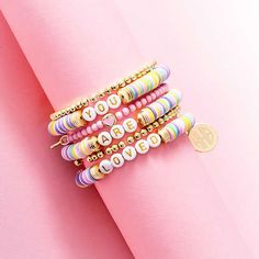 Brighten your little one's day with the 'You Are Loved' Bracelet Stack, featuring fun, multi-color stretch bracelets. This cheerful set is a daily reminder of love and positivity, perfect for adding a pop of color to any outfit!Mini bracelet stack has an elastic fit intended to accommodate ages 4-8Made of brass, vinyl, acrylic, and zincSix fun stackable stretch bracelets with a monogrammed 16 mm charm Vinyl Acrylic, Mini Bracelet, Marley Lilly, Love Bracelets, Bracelet Stack, Daily Reminder, Stretch Bracelets, Color Pop, Jewelry Bracelets