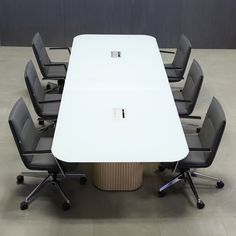 a white table with six chairs around it