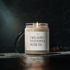 a candle that says i will glady little puncha ho for you on it