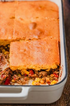 a casserole dish with meat and vegetables in it