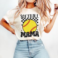 a woman wearing a softball mom t - shirt