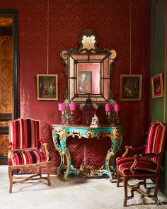 an ornately decorated room with red and green walls