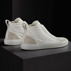 Our Solstice Skate High Top Sneaker is made in a crisp matte nylon and features a modern lace up detail with hidden eyelets. Mesh inner lining is used for comfort and breathability. Suede trim adds a luxurious edge to this casual, everyday shoe.Additional Information:• 100% Nylon• Imported Cream Leather High-top Sneakers For Spring, Modern High-top Sneakers With Textured Sole For Spring, Modern High-top Sneakers For Spring, Everyday Shoe, High Top Sneaker, Everyday Shoes, Casual Everyday, Women Lace, Sneakers White