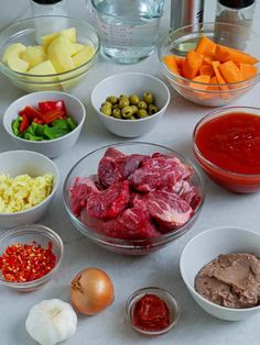 the ingredients are laid out in bowls on the table