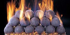 a pile of rocks sitting in front of fire