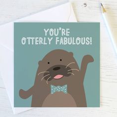 a card with an otter wearing a bow tie