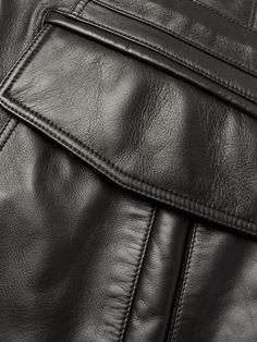 Balenciaga's supple leather jacket has a statement-making oversized fit emphasised by padding and lengthy sleeves. Customise the voluminous shape by adjusting the waist drawstrings and snap-fastening cuffs. Luxury Leather Outerwear With Pockets, Fall Leather Outerwear With Side Pockets, Luxury Leather Outerwear With Belt Loops, Balenciaga Leather Jacket, Sherpa Trucker Jacket, Leather Jacket For Men, Balenciaga Men, Balenciaga Leather, Jacket For Men