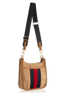 Give your accessories a sleek update with Shiraleah's Blakely Mini Cross-Body handbag. This classic cross-body silhouette is the perfect size for all of your daily essentials without being too big and bulky. Made from a classically neutral-tone sueded fabric, this bag matches every outfit effortlessly while the trendy racer stripe design adds a playful pop of color. The perfect bag for fall! Features a detachable, adjustable cross- body strap; a magnetic snap closure, and 1 outer pocket with sna Body Silhouette, Spa Wraps, Tan Body, Accessories Display, Mini Cross, Fall Accessories, Daily Essentials, Zip Pouch, Mini Crossbody