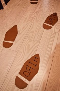 wooden floors with different types of foot prints on them