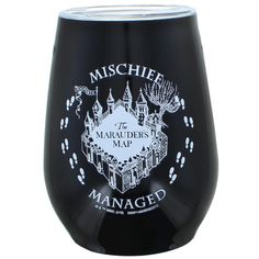 a black wine glass with an image of a castle on it