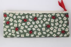 Pencil Case Lady Bugs Floral Fabric Zipper Pouch Makeup Cosmetic Bag Travel Back to School Teacher Gift Personalized First Name/Word by BeyondSassyLLC on Etsy Green Pencil Case Pouch For Daily Use, Green Pencil Case With Zipper Closure, Green Pouch Pencil Case With Zipper, Green Pouch Pencil Case For Daily Use, Green Pencil Case With Zipper Closure For Gift, Green Pencil Case With Zipper Closure As Gift, Rectangular Green Pencil Case, Pouch Makeup, Eyeglasses Case