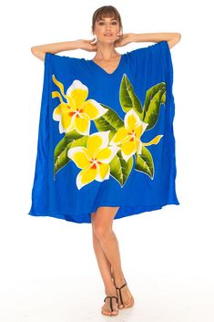 Get ready for the perfect lounge dress/coverup. It is a piece of art you can wear. Short sleeve caftan makes it perfect for sunny days. The lightweight breathable material makes it an ideal companion for vacations. Easy to slip into and take care of. Hand-painted bold tropical flowers from Bali, Indonesia create an elegant kaftan. Lightweight material Hand-painted tropical flowers Soft and comfortable rayon material Machine wash with like colors, hang to dry Summer Beach Poncho With Relaxed Fit, Relaxed Fit Poncho For Beach And Summer, Relaxed Fit Poncho For Beach In Summer, Free Size Batwing Sleeve Tunic For Beach, Summer Beach Poncho In Relaxed Fit, Oversized Batwing Sleeve Poncho For Beach, Summer Vacation Poncho With Short Sleeves, Oversized Poncho With Batwing Sleeve For The Beach, Summer Beach Tunic In Red