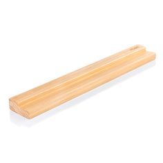 a wooden object on a white background