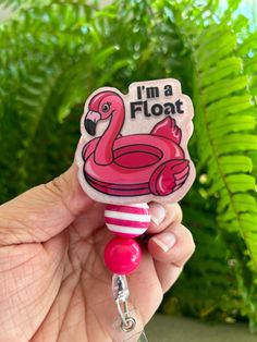 This badge reel is a fun way to let others know you are. Float Nurse.  It comes with 2 coordinating bubblegum beads.  High quality badge reel that is designed for lots of use.  This badge reel is super easy to wipe clean and approximate size is  2" x 2" Available as permanent or 3M hook to make them interchangeable Novelty Pink Badge Holder For Birthday, Fun Pink Badge Holders, Novelty Pink Badge Reel, Personalized Fun Pink Badge Reel, Pink Fun Craft Supplies For Hobby, Fun Pink Craft Supplies For Hobby, Fun Pink Craft Supplies For Hobbies, Bubblegum Beads, Nurse Badge Reel