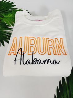 Celebrate your Auburn pride with our stylish Embroidered Auburn Alabama Sweatshirts. Designed for Auburn University fans, these sweatshirts feature high-quality embroidery that showcases your school spirit. Available in a variety of colors and sizes, these sweatshirts are perfect for game days, alumni events, or just showing off your Auburn pride around town. Key Features: 🧡 Vibrant Orange: Our Auburn, Alabama Sweatshirt is a tribute to Auburn's iconic color, making it the ultimate way to showc Varsity T-shirt With Embroidered Graphics For Fall, Collegiate Long Sleeve T-shirt With Letter Embroidery, Collegiate Long Sleeve Sweats For College, Sporty Embroidered Crew Sweatshirt, White Embroidered Sporty Sweatshirt, Collegiate Crew Neck Sweatshirt With Embroidered Graphics, Fall Varsity Sweatshirt In French Terry, Crew Neck Hoodie With Embroidered Logo For College, Varsity French Terry Sweatshirt For Fall