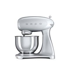 an electric mixer on a white background with the word smeg written in silver letters