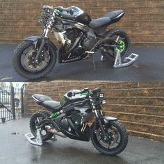 two motorcycles parked next to each other in front of a brick wall