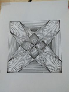 a drawing on paper with lines in the shape of an abstract star, which appears to be interlocked