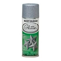 a spray can that is silver with stars on it