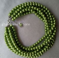 I make the necklace to use 8mm green glass pearls.The necklace total length is select.It will is shorter when it be twist,Ii is good necklace for your great wedding. I can make different type necklace to your requirements,Please feel free to contact me if you have any question. Thank you so much. matches earrings: https://www.etsy.com/listing/188430232/green-pearl-earringsglass-pearl?ref=shop_home_active_15 Matching dangling earring: https://www.etsy.com/listing/233524668/bright-green-earrings8m Green Large Beads Necklace For Party, Green Pearl Necklace With Round Beads For Party, Cheap Green Pearl Necklace, Unique Green Necklace With Large Beads, Green Choker Necklace, Green Pearl Necklace, Bride Pearl Necklace, Green Bead Necklace, Green Large Beaded Glass Necklaces