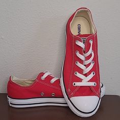 Size 2.5 Red Converse Low Top. Nwot! Very Clean Classic Red Low Tops With White Laces, A Few Small Discoloration Spots On The Laces, But Hardly Noticable. Aka Chucks Or Chuck Taylor Red High-top Canvas Shoes For Spring, Red Cotton Converse Sneakers, Red Sporty Canvas Shoes For Sports, Red Cotton Sneakers For Spring, University Red Low-top Sneakers For Spring, Spring University Red Low-top Sneakers, Red Canvas Shoes For Spring Streetwear, Casual Low-top Sneakers With Red Accents, Casual Red Cotton Sneakers