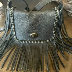 Lightly Used Beautiful Coach Dakota Fringe Bag. This Bag Is Absolutely Gorgeous With Amazing Detail Throughout. It Will Get U Where U Need To Go With Style & The Ability To Carry Some Stuff ;-) Coach Shoulder Bag With Gunmetal Hardware For On-the-go, Coach Satchel Shoulder Bag With Gunmetal Hardware, Luxury Coach Satchel With Gunmetal Hardware, Luxury Coach Bags With Gunmetal Hardware, Coach Rectangular Shoulder Bag With Gunmetal Hardware, Coach Crossbody Bag With Gunmetal Hardware, Bags Coach, Fringe Bags, Pebbled Leather