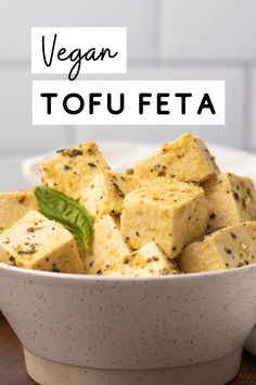 vegan tofu in a white bowl on a wooden table with the title overlay