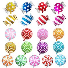 assorted candy lollipops in various colors and sizes on a white background