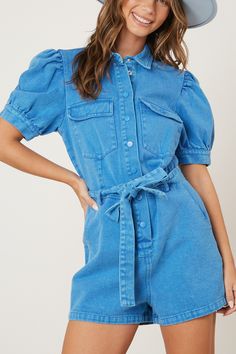 washed twill denim puff sleeve romper in washed blue style #: IR34941-03 - 3/4 button down closure - Front pockets with flap - Waist tie - Collared - Short puff sleeves Blue Collared Jumpsuits And Rompers For Spring, Collared Blue Jumpsuits And Rompers For Spring, Spring Collared Denim Jumpsuits And Rompers, Blue Cotton Button-up Denim Jumpsuit, Blue Denim Jumpsuit With Short Sleeves And Button Closure, Blue Short Sleeve Denim Jumpsuit With Button Closure, Peach Love, J Cole, Blue Style