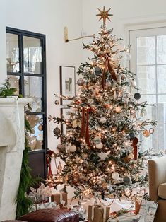 a decorated christmas tree in a living room