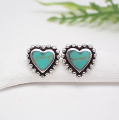 This is a great pair of sterling silver simple turquoise stud earrings in the shape of a heart with a dotted edge. The earrings measure .4" wide. They come with sterling silver backs. Each stone varies so yours may appear different than the one shown in the photo but will be a similar color. Pisces Scorpio, Zodiac Pisces, Pisces And Scorpio, Chakra Throat, Turquoise Stud Earrings, Natural Stone Earrings, Scorpio Sagittarius, Heart Studs, Heart Earrings Studs