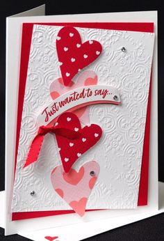 a valentine's day card with hearts on it