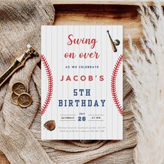 a baseball themed birthday party is set up on a wooden table with an old pair of scissors