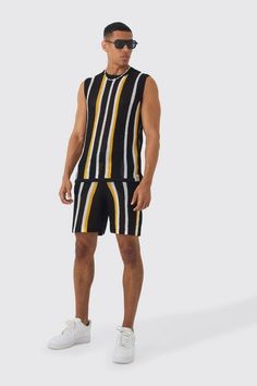 Let a vest take you seamlessly from the poolside to the dance floor this summer. The sun's out, guns out message doesn't go a miss here. Show off and look best in your favourite MAN vest. Choose plain colours, stripes or graphic prints, and finish off your outfit with shorts and flip-flops. Looking for a top for your gym session? Our range of performance-ready gym vests got you covered.Style: Short TracksuitDesign: Open StitchFabric: AcrylicLength: RegularNeckline: CrewSleeve Length: Sleeveless Tracksuit Design, Man Vest, Crochet Shirts, Short Tracksuit, Mens Tracksuit Set, Gym Vests, Full Tracksuit, Shirts And Shorts, Black Tracksuit