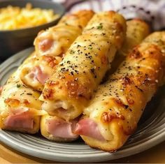 Ham and Cheese Sticks – Naomi's Recipes Easy Filling Appetizers, Finger Food For Large Crowd, Upscale Bar Food Ideas, French Onion Sausage Rolls, Cheddar Cheese Sticks, Ham And Cheese Rolls, Hot Sandwiches, Grilled Ham And Cheese, Homemade Appetizer