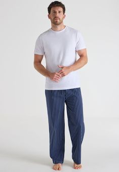 Update your nightwear collection with this pyjama bottoms set. Containing pairs of pj bottoms one in a blue check and another in a dark blue stripe, both with elasticated waistband with drawstring. Perfect for mix and matching and a comfy option for sleepwear this season. Pajama Men, Mens Pajama, Pj Bottoms, Summer 2025, Fashion Design Sketches