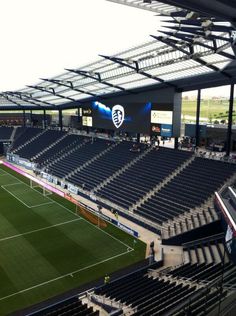 an empty soccer stadium filled with lots of seats