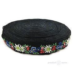 a black ribbon with colorful flowers on it